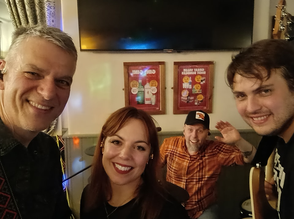 Trinity Road four-piece backstage selfie before a gig